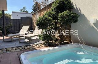 Wohnung kaufen in 61231 Bad Nauheim, Exklusive Gartenwohnung mit Pool, Sauna und Garage in bester Lage