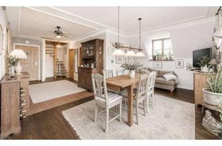 Wohnung kaufen in 81249 München, Gemütlich, hell und kunstvoll – 2,5-Zimmer-Wohnung mit 120 m² Gartenparadies