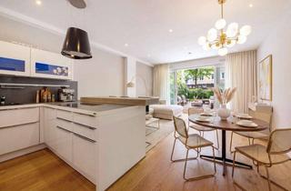 Wohnung kaufen in 80797 Neuhausen-Nymphenburg, Moderne 2-Zimmer-Gartenwohnung mit Wintergarten und Deckenhöhen von 2,80m
