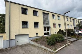 Wohnung kaufen in 44269 Schüren, Wohnen im Grünen: Hochparterre-Wohnung mit Balkon, Garage und Gemeinschaftsgarten