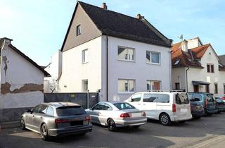 Einfamilienhaus kaufen in 65474 Bischofsheim, Einfamilienhaus mit Anbau, Doppelgarage und Stellplätzen