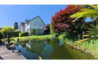 Mehrfamilienhaus kaufen in 46485 Wesel, Gehobenes Mehrfamilienhaus mit Garten, Schwimmteich und Kanzlei/Büro