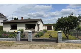 Haus kaufen in Hohenbrucher Straße ..., 16515 Oranienburg, Hübscher und gepflegter Bungalow mit Nebengelass auf großem Grundstück in schöner ruhiger Lage