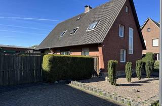 Haus kaufen in 46414 Rhede, Freistehendes Zweifamilienhaus mit großem Grundstück in zentraler Lage von Rhede zu verkaufen