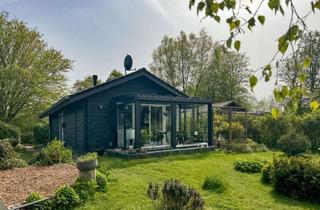 Haus kaufen in 24351 Damp, Sanierter Ferienbungalow mit großem Gartenidyll im Ostseebad Damp