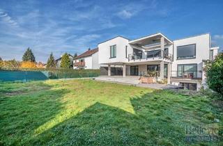 Haus kaufen in 61206 Wöllstadt, Architektenhaus im Bauhausstil mit schönem Garten und großer Süd-Terrasse in ruhiger Lage
