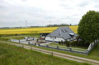 Einfamilienhaus kaufen in 26434 Wangerland, Wohnen mit Charakter: Einfamilienhaus in Wangerland
