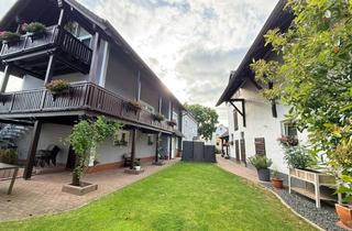 Haus kaufen in 61169 Friedberg, Friedberg: Ein Anwesen voller Möglichkeiten – Wohnen, Arbeiten und Investieren vereint