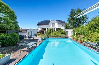 Villa kaufen in 52525 Heinsberg, Exklusives Wohnen mit modernem Komfort inmitten eines privaten Parkgartens