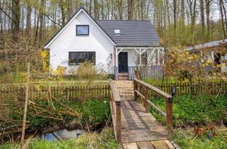 Einfamilienhaus kaufen in 24955 Harrislee, Einfamilienhaus in Wassersleben: Strandnah wohnen nahe Flensburger Förde und Waldrandlage