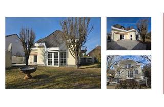 Einfamilienhaus kaufen in 65428 Rüsselsheim, Rüsselsheim am Main - Einfamilienhaus mit Einliegerwohnung in Bestlage