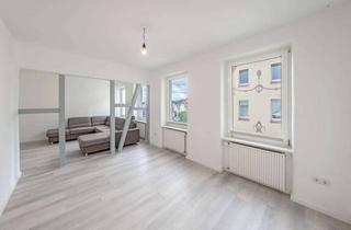 Wohnung kaufen in 58511 Lüdenscheid, Altbaucharme trifft Rendite: 4-Zimmer-Wohnung mit 6 Stellplätzen