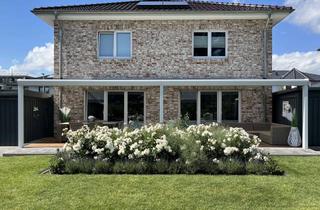 Wohnung kaufen in 25451 Quickborn, Neuwertiges EG in Stadtvilla mit großem Traumgarten - Leben wie im Haus