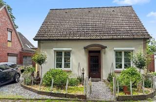 Einfamilienhaus kaufen in 26954 Nordenham, Nordenham: Einfamilienhaus mit Garage, Garten, Partyraum und überdachter Terrasse