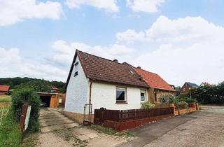 Doppelhaushälfte kaufen in 31089 Duingen, Mit Blick auf das Leinebergland! Charmante Doppelhaushälfte inklusive Garage und Garten in Duingen