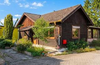 Haus kaufen in 91341 Röttenbach, Sanierungsbedürftiges Bungalow mit Nebengebäude & Garage und Keller in Röttenbach