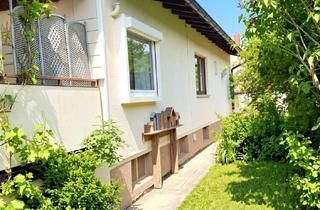 Einfamilienhaus kaufen in 61231 Bad Nauheim, Charmantes Einfamilienhaus mit Einliegerwohnung – Wohnen, Arbeiten oder Vermieten unter einem Dach