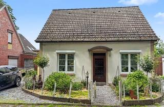 Einfamilienhaus kaufen in 26954 Nordenham, Nordenham: Einfamilienhaus mit Garage, Garten, Partyraum und überdachter Terrasse