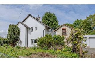 Einfamilienhaus kaufen in 63584 Gründau, Gründau - Freistehendes Einfamilienhaus mit großem Grundstück, Doppelgarage & vielseitigem Potenzial in Gründau
