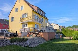 Haus kaufen in 65232 Taunusstein, Dreiklang - 3-Parteienhaus in Taunusstein-Hahn