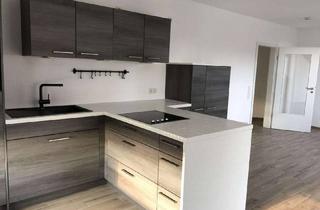 Wohnung kaufen in 85080 Gaimersheim, Hochwertige Dachgeschosswohnung in zentraler Lage in Gaimersheim