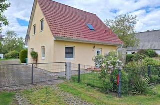 Einfamilienhaus kaufen in 17506 Kölzin, Kompaktes Einfamilienhaus mit Doppelgarage unweit von Gützkow