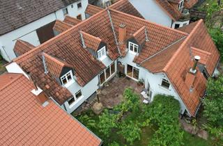 Einfamilienhaus kaufen in 69168 Wiesloch, Großzügiges Einfamilienhaus mit 2 zusätzlichen kleineren Wohnungen und traumhaftem Garten