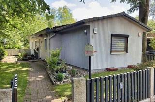 Haus kaufen in 31311 Uetze, Uetze: Charmantes Holzhaus am Spreewaldsee - Wassergrundstück