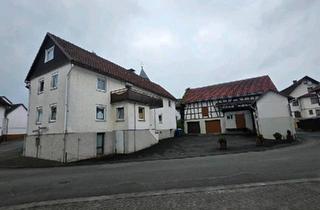 Haus kaufen in 35075 Gladenbach, Gladenbach - Haus mit Einliegerwohnung zu verkaufen