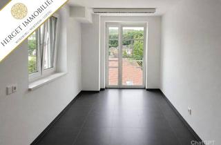 Wohnung kaufen in 63773 Goldbach, Außergewöhnliche Wohnung im DG mit Stellplatz