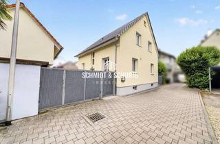 Haus kaufen in 76646 Bruchsal, Kleine ruhige Familien-Oase mit Nebengebäude, Garten und Innenhof