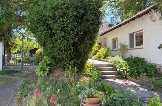 Haus kaufen in 55271 Stadecken-Elsheim, Exklusiver Bungalow mit parkähnlichem Grundstück und maximaler Privatsphäre
