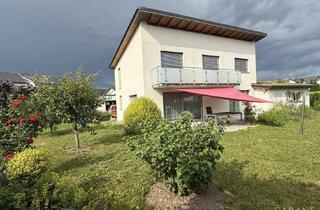 Einfamilienhaus kaufen in 79790 Küssaberg, Modernes, freistehendes Einfamilienhaus mit einladender Terrasse und herrlichem Garten