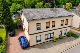 Haus kaufen in 25767 Albersdorf, MFH mit erheblichen Mietsteigerungsreserven | 4 Wohneinheiten | 5 Garagen