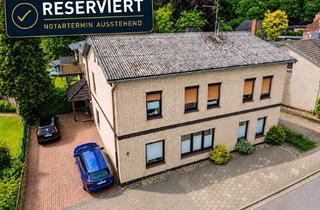 Haus kaufen in 25767 Albersdorf, MFH mit erheblichen Mietsteigerungsreserven | 4 Wohneinheiten | 5 Garagen