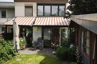 Haus kaufen in 65824 Schwalbach am Taunus, Flexibles Wohnkonzept mit Gartenidylle – Zweifamilienhaus
