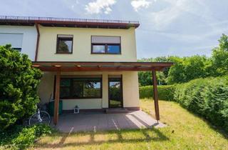 Haus kaufen in 82008 Unterhaching, **Heike Borchers Immobilien**Reiheneckhaus mit Potenzial in freundlicher Umgebung**Süd-West-Garten**