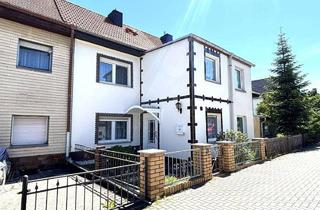 Haus kaufen in Greppiner Straße 26, 06792 Sandersdorf, Zentrales Reihenmittelhaus auf ca. 146 m² Wohnfläche mit üppigen Nebegelass im Ortsteil Sandersdorf