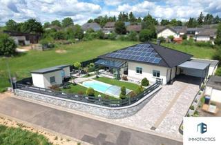 Haus kaufen in 55595 Traisen, Exklusiver Bungalow mit Pool, Wintergarten, PV-Anlage, Wärmepumpe & Garage - Energieeffizienz A+