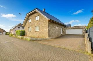 Einfamilienhaus kaufen in 52382 Niederzier, Wohnen mit Stil - Freistehendes Einfamilienhaus mit Garten & Garage