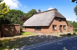 Haus kaufen in 26954 Nordenham, Gemütliches Reetdachhaus in herrlich ruhiger Wohnlage