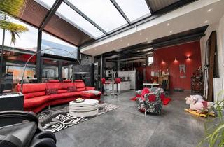 Gewerbeimmobilie kaufen in 47495 Rheinberg, Arbeiten & Wohnen vereint: Moderne Gewerbehalle mit exklusiver Wohnung, Pool & Sauna in Rheinberg