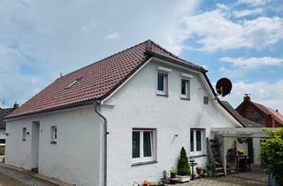 Einfamilienhaus kaufen in 26736 Krummhörn, Nordsee-Flair inklusive: teilmodernisiertes Einfamilienhaus mit Garage in Warftenlage