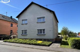 Haus kaufen in 66333 Völklingen, Geräumiges Zweifamilienhaus mit Garten und Garage - bezugsfrei