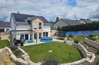 Einfamilienhaus kaufen in 54310 Ralingen, Ralingen an der Sauer - Energieeffizientes Familienanwesen mit Weitblick, großem Grundstück und Nähe zu Luxemburg