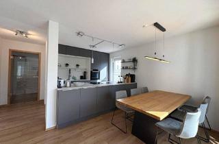 Wohnung kaufen in 88471 Laupheim, Laupheim - Neuwertige 3,5-Zimmer-Wohnung mit traumhaftem Garten in Toplage in Laupheim