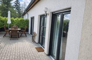 Wohnung kaufen in 14789 Wusterwitz, Wusterwitz - Moderne 3-Zimmer-Wohnung in Wusterwitz, Bungalowcharakter mit Garten + vermietete Gewerbeeinheit
