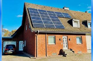 Haus kaufen in 47495 Rheinberg, Rheinberg - Ein neues Zuhause für zwei Familien, bietet diese großzügige DHH, in grünen Umfeld!