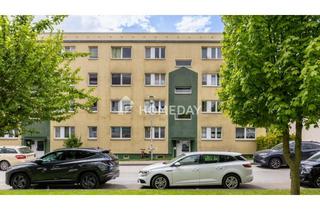 Wohnung kaufen in 23972 Dorf Mecklenburg, Helle 3-Zimmer-Wohnung mit Loggia und Grünblick