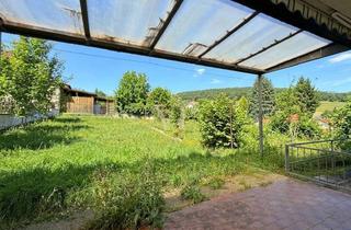 Haus kaufen in 76889 Schweigen-Rechtenbach, Wohnen mit Aussicht: Gut geschnittener Bungalow mit Garten und zwei Garagen
